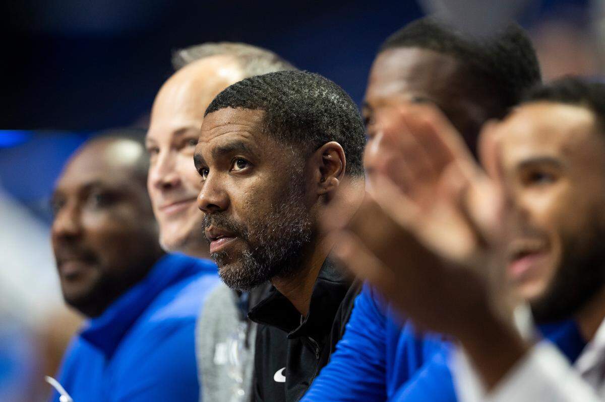 UK assistant coach Jason Hart watches the Wildcats practice during the preseason. Hart spent the past three years as the head coach of G League Ignite.