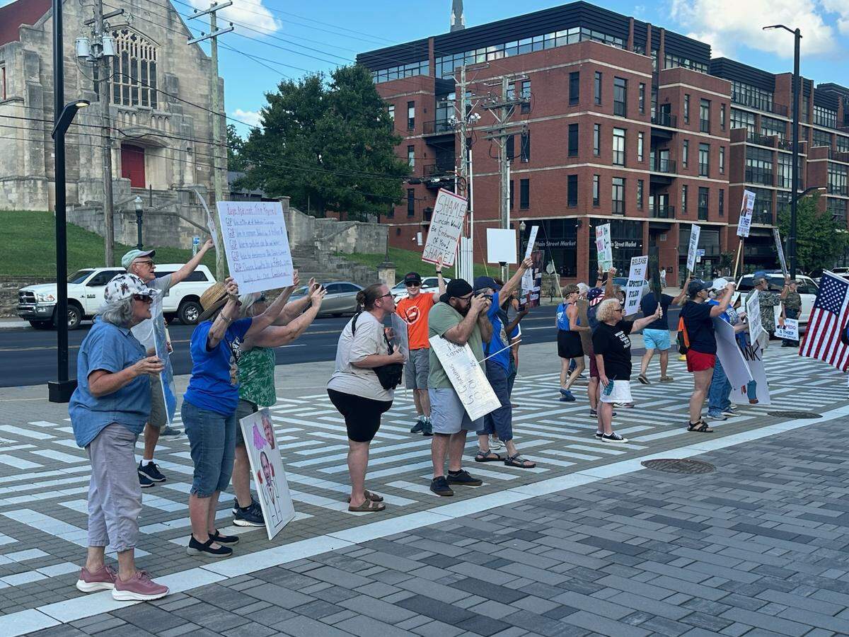 A group protests the Republican fundraiser Lincoln Dinner outside Central Bank Center in downtown Lexington Saturday, Aug. 9, 2025.