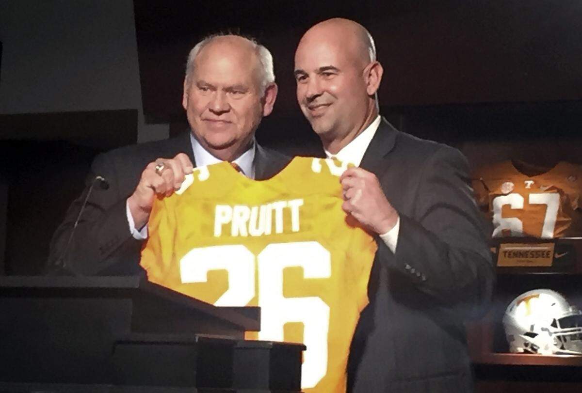 After a meandering coaching search that became a national punch line, Tennessee ended up with Phillip Fulmer, left, as its athletics director and former Georgia and Alabama defensive coordinator Jeremy Pruitt as its head coach.