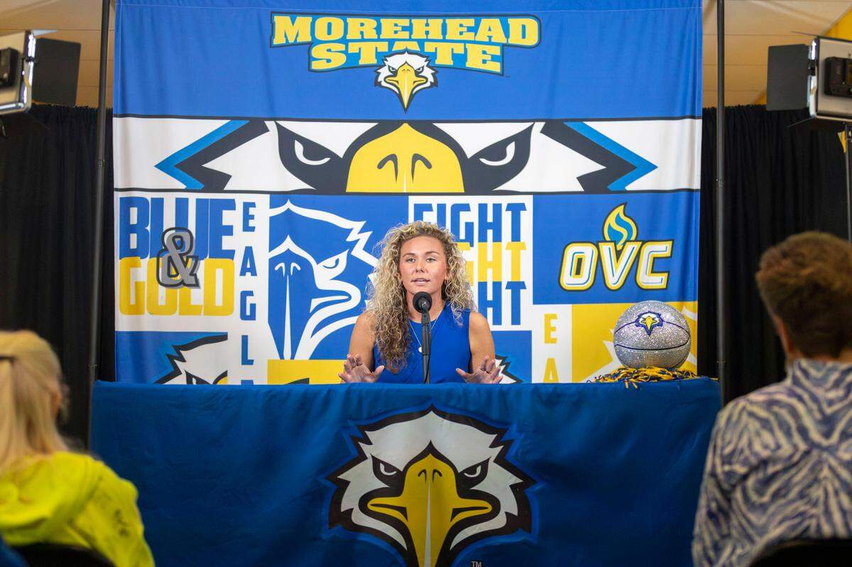 At 29, Ashton Feldhaus will begin her first season as Morehead State women’s basketball coach in 2025-26. The former Madison Central High School hoops standout is the granddaughter of ex-Kentucky Wildcats men’s basketball player Allen Feldhaus, the niece of ex-UK player Deron Feldhaus and the daughter of longtime Madison Central boys hoops coach Allen Feldhaus Jr.