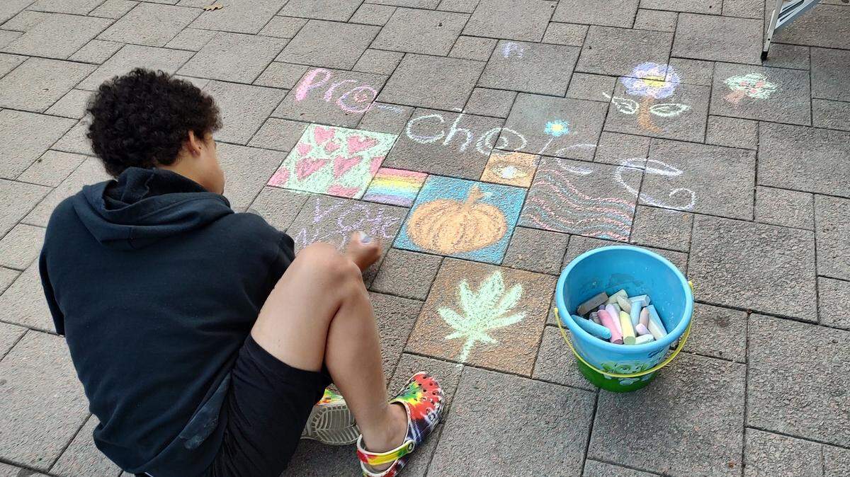 The Rally For Your Rights drew several dozen people to the courthouse plaza in downtown Lexington Friday evening. Speakers included a number of Kentucky political candidates who voiced their support for abortion rights.
