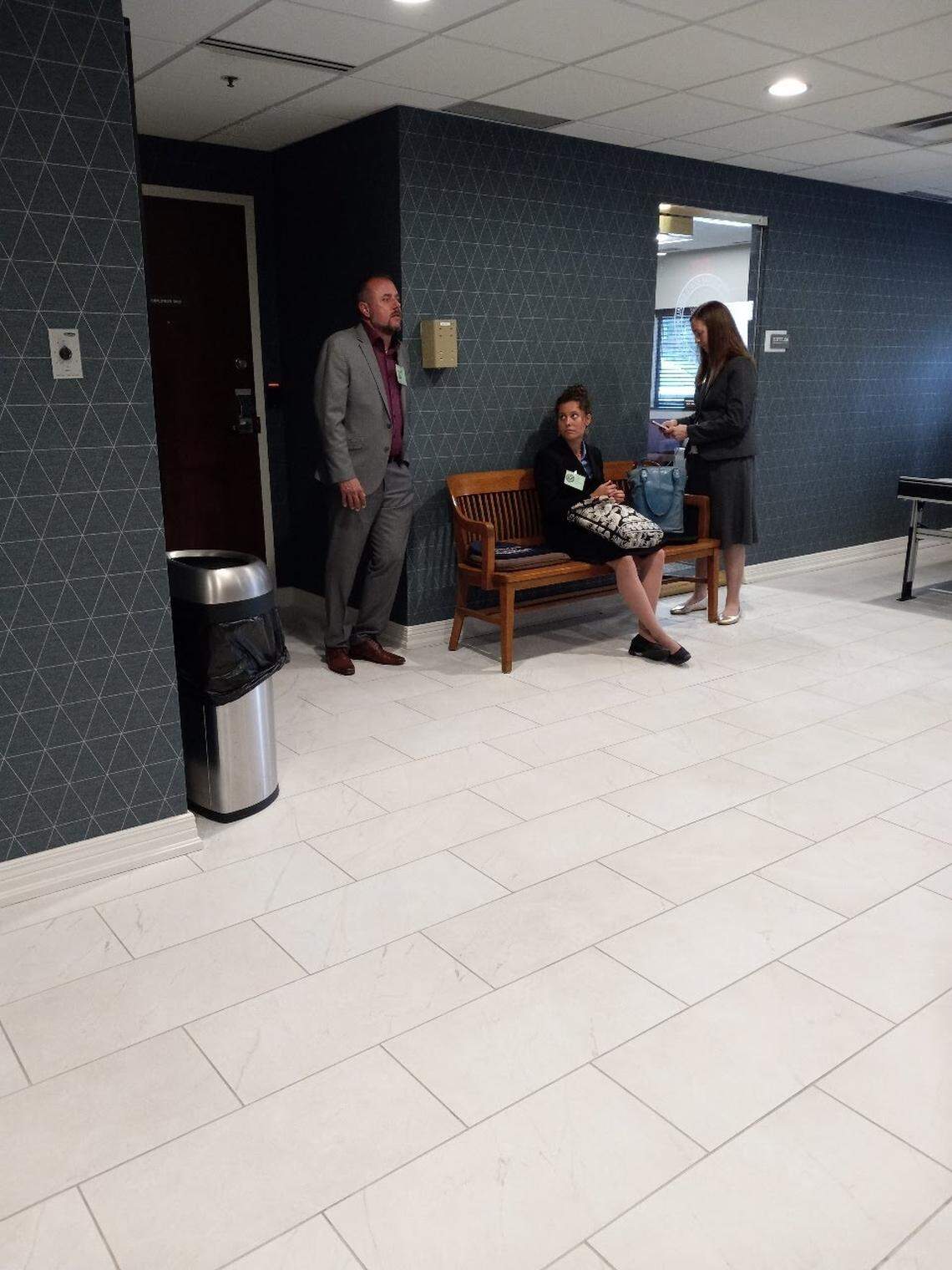 Lexington Blue owner Brad Pagel, left, waits with his attorney, Adrienne Southworth, far right, before a creditors meeting at U.S. Bankruptcy Court in Lexington, Ky., on Aug. 11, 2025.