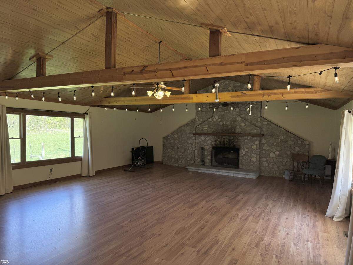 A large stone fireplace inside the home referred to as “the White House” at Witheniwe Farms in Lawrence County, Ky.