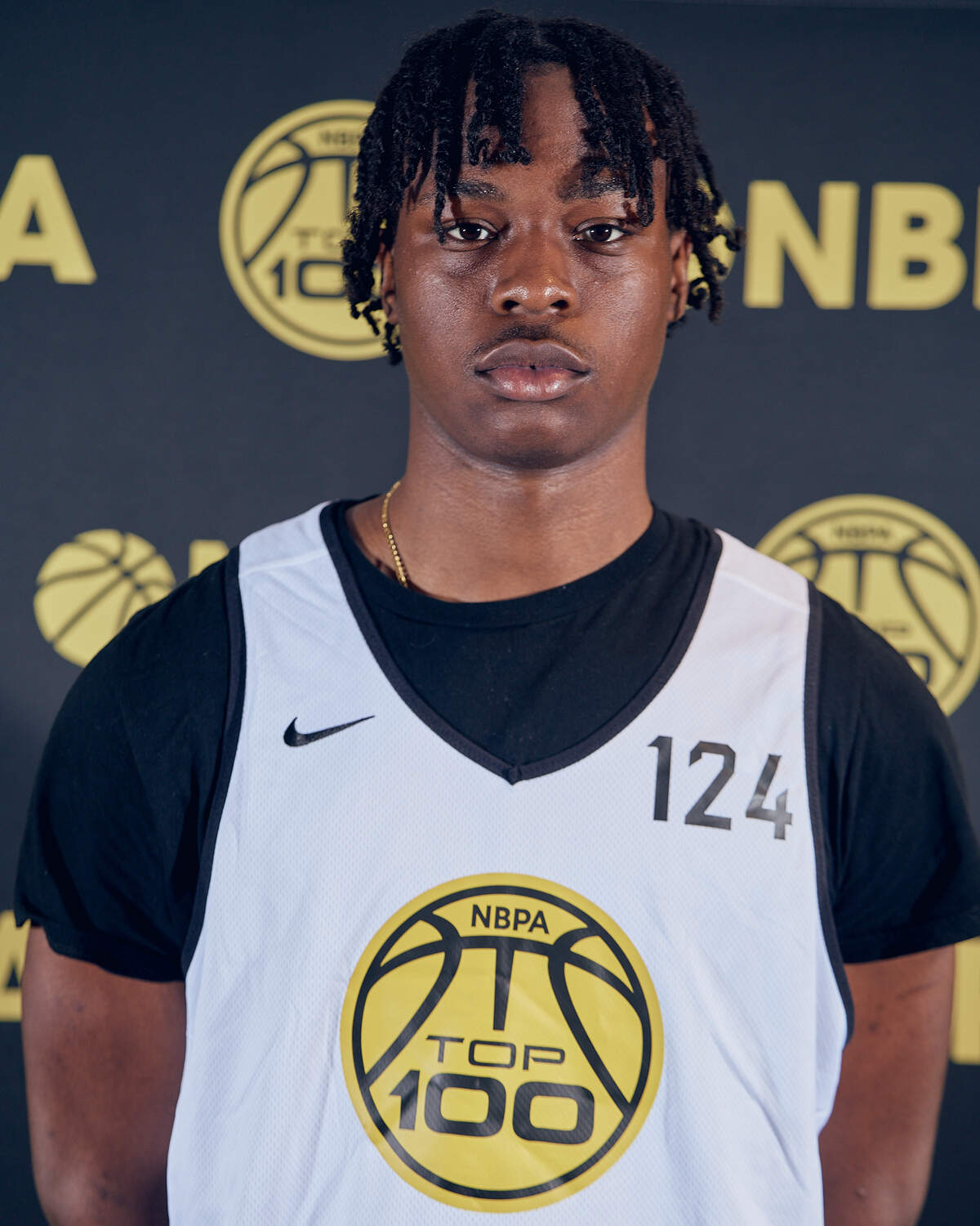 College basketball recruit Caleb Ourigou poses for a headshot during the NBPA Top 100 Camp in June 2026 at the Rock Hill Sports & Event Center in Rock Hill, South Carolina.