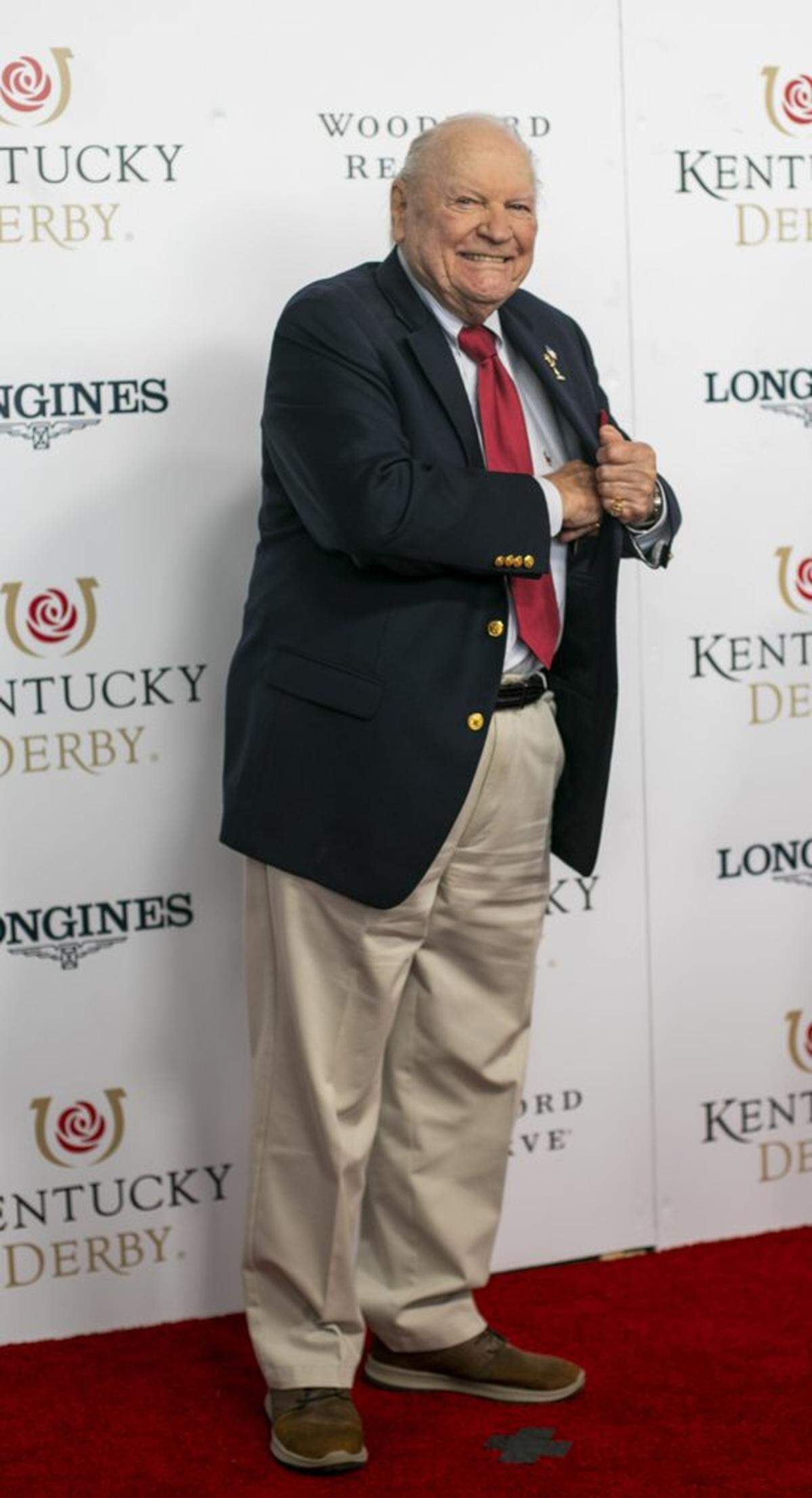 Conrad Bucchman walks the red carpet at Churchill Downs in Louisville, Ky., Saturday, May 7, 2022.