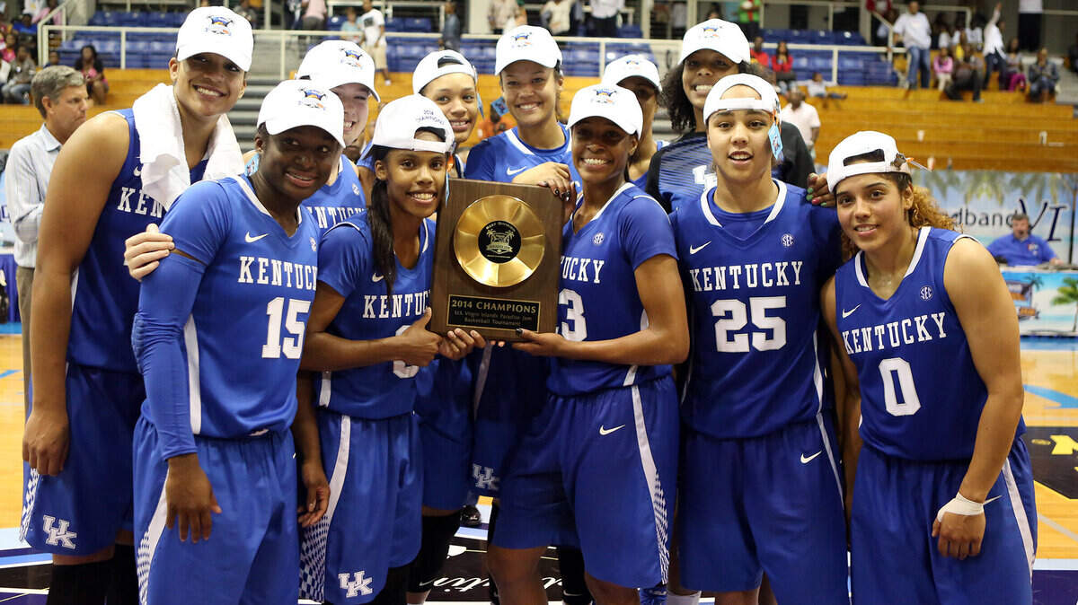 The University of Kentucky women's basketball team showed off its trophy after winning the Paradise Jam Island Tournament at St. Thomas, Virgin Islands on Saturday night. (Britney McIntosh, UK Athletics)