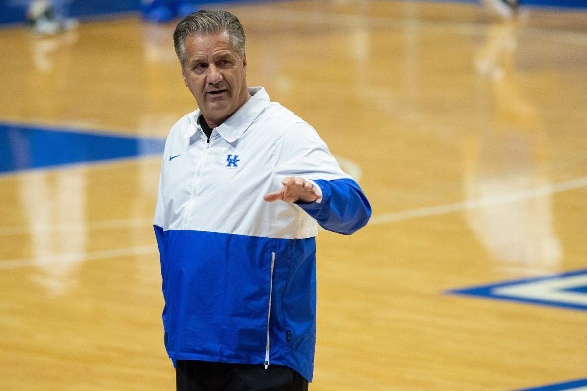 Kentucky head coach John Calipari talked with NBA scouts on hand in Rupp Arena on Monday to watch the Wildcats’ basketball practice.