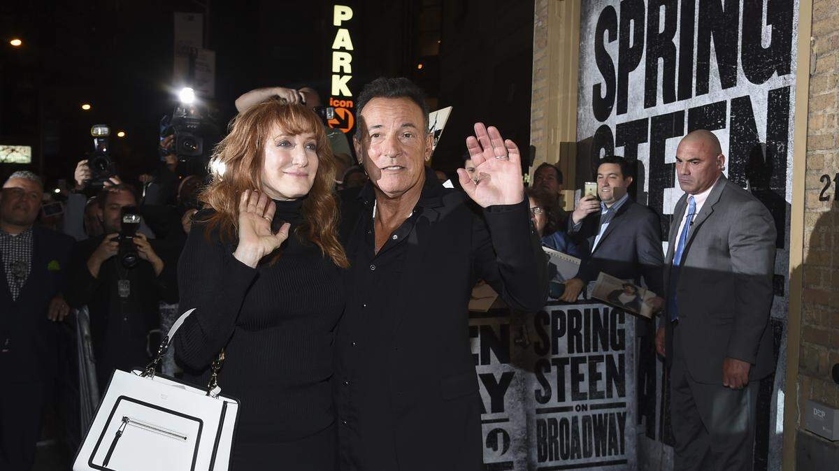 Musician Bruce Springsteen and his wife Patti Scialfa exit out the stage door after the “Springsteen On Broadway” opening night performance at the Walter Kerr Theatre on Thursday, Oct. 12, 2017, in New York. A CD set from the limited engagement will be available just in time for Christmas.
