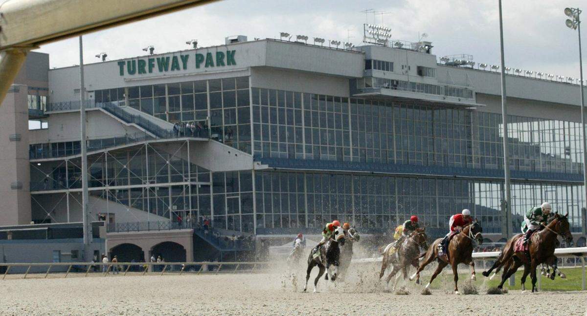 Horses raced on the synthetic surface at Turfway Park. The track is the only one in Kentucky with a synthetic surface for winter racing. Churchill said it would put in one at “New Latonia” if approved.