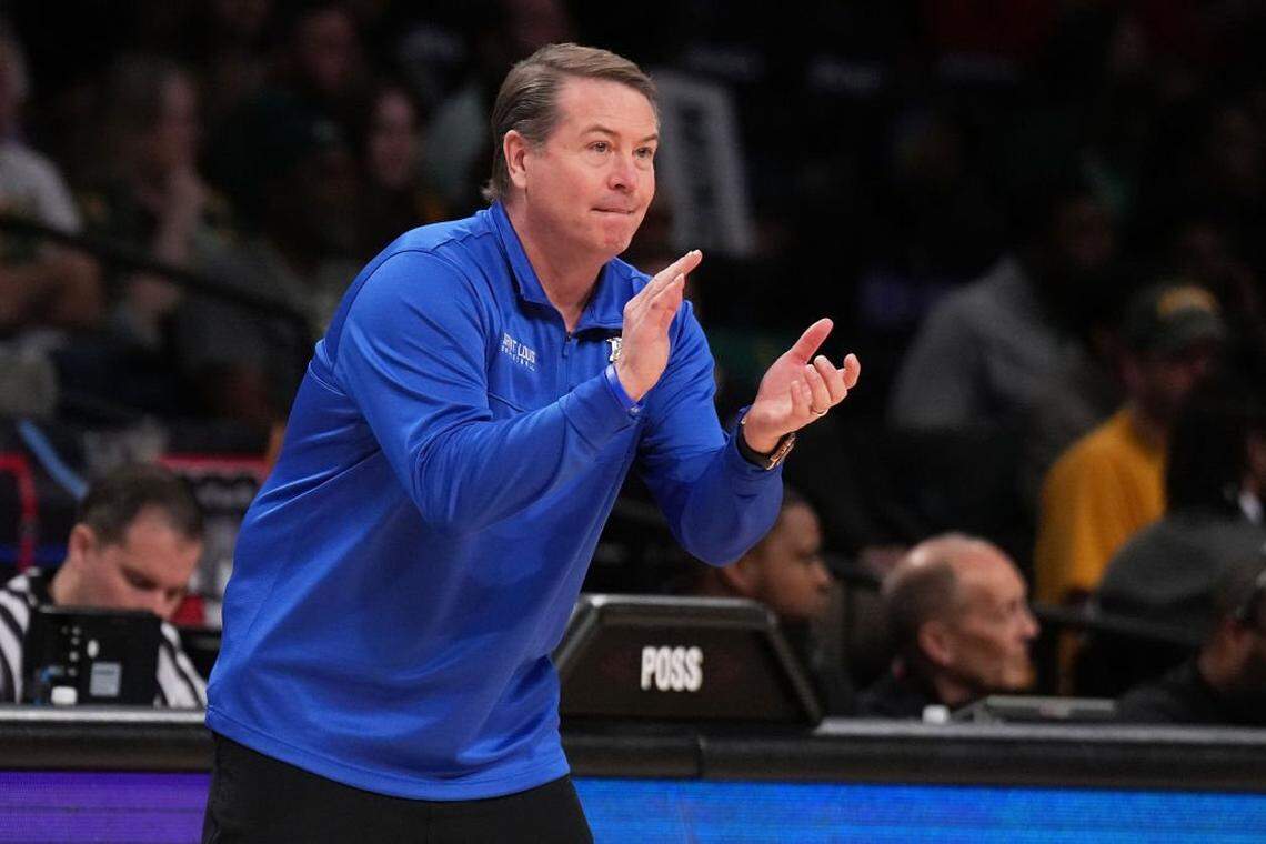 BROOKLYN, NEW YORK - MARCH 09: Head coach Travis Ford of the Saint Louis Billikens looks on from the bench against the George Mason Patriots in the first half during the Quarterfinals of the A10 Basketball Tournament at Barclays Center on March 09, 2023 in Brooklyn, New York. (Photo by Mike Stobe/Getty Images)