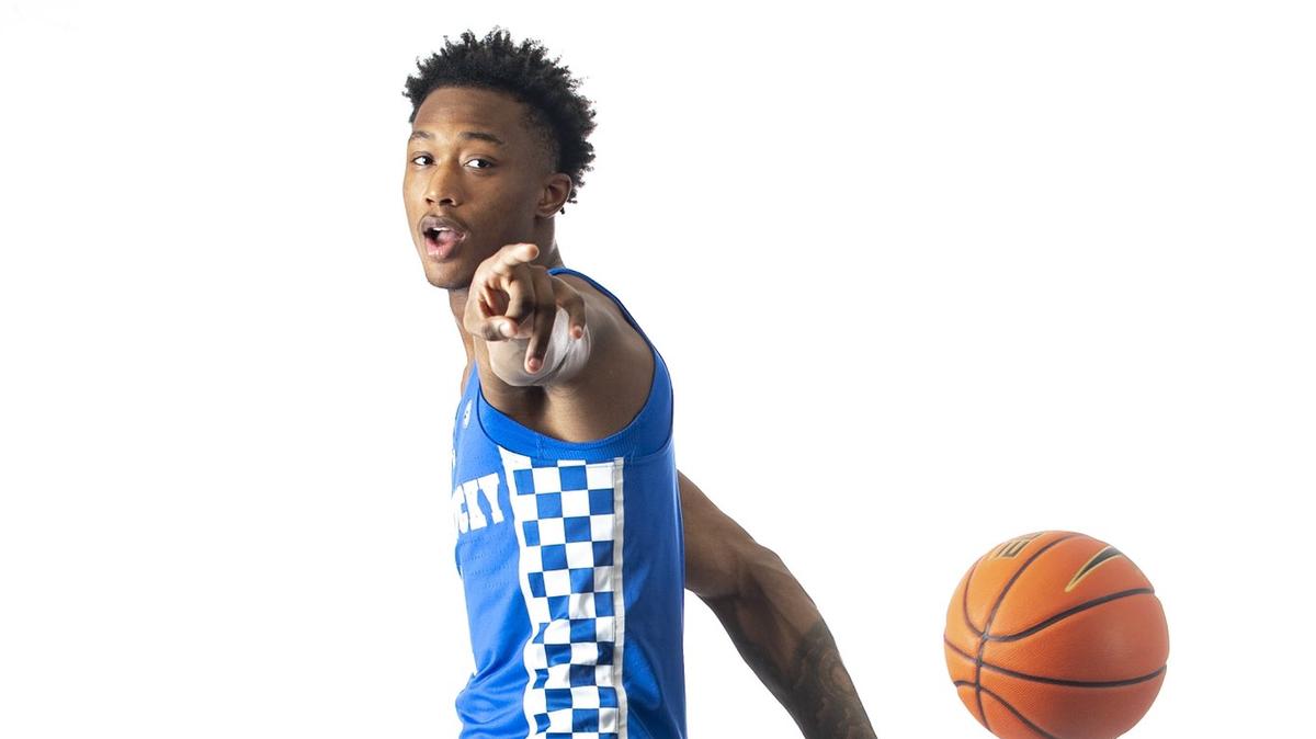 Ron Holland posted photos of himself wearing a Kentucky basketball jersey following his official visit to UK.