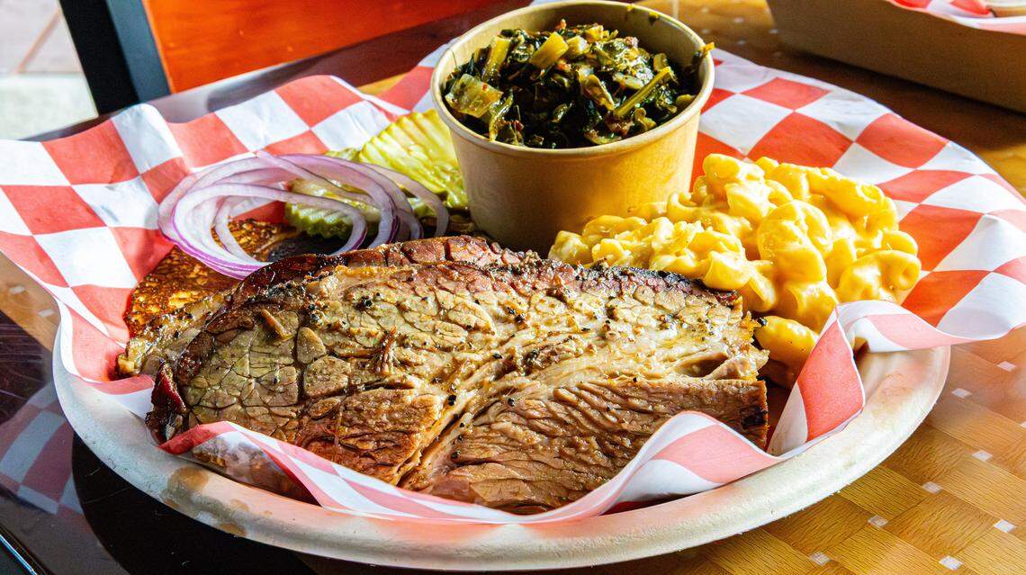 The Smoked Brisket Platter, served with southern collards and Ethel's mac & cheese, at the new barbecue restaurant, Nolo's On The Levee, on Jan. 23, 2026, in Mt. Sterling, Ky.