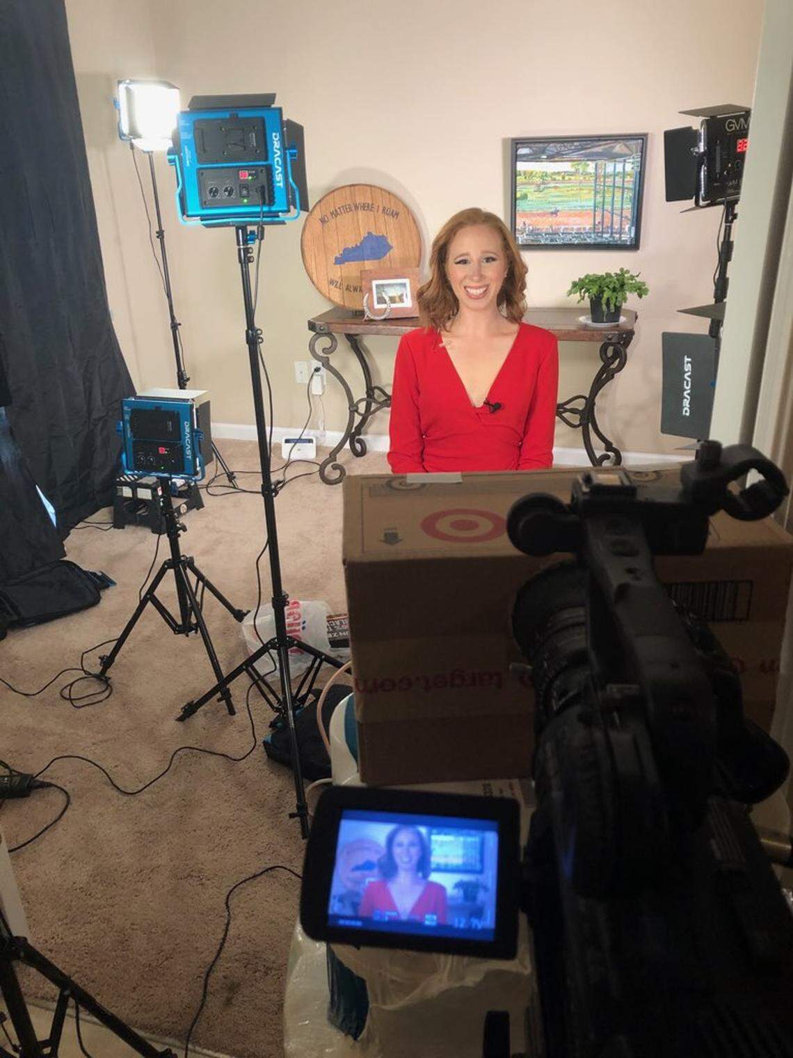 Veronica Jean Seltzer has set up her camera and lights in her apartment to begin anchoring the WTVQ-TV evening newscasts from home. She’s also rigged up a prompter in a box.