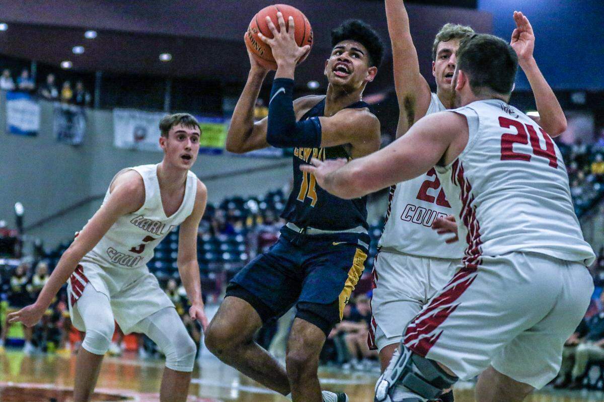 Jevonte Turner drove to the basket during Knox Central’s 72-68 win over Harlan County in the 13th Region championship game on March 9.