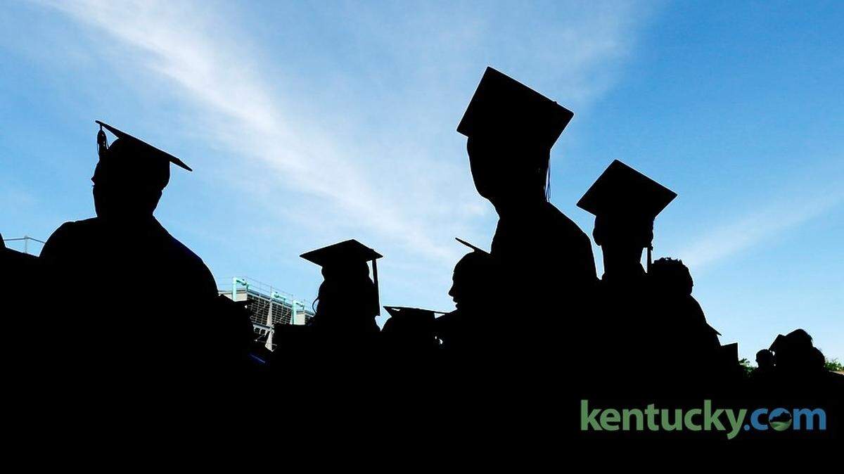 Graduates walked out the back entrance after Tates Creek High School graduation at Rupp Arena in Lexington, Ky., on June 7, 2014. Photo by Pablo Alcala | Staff
