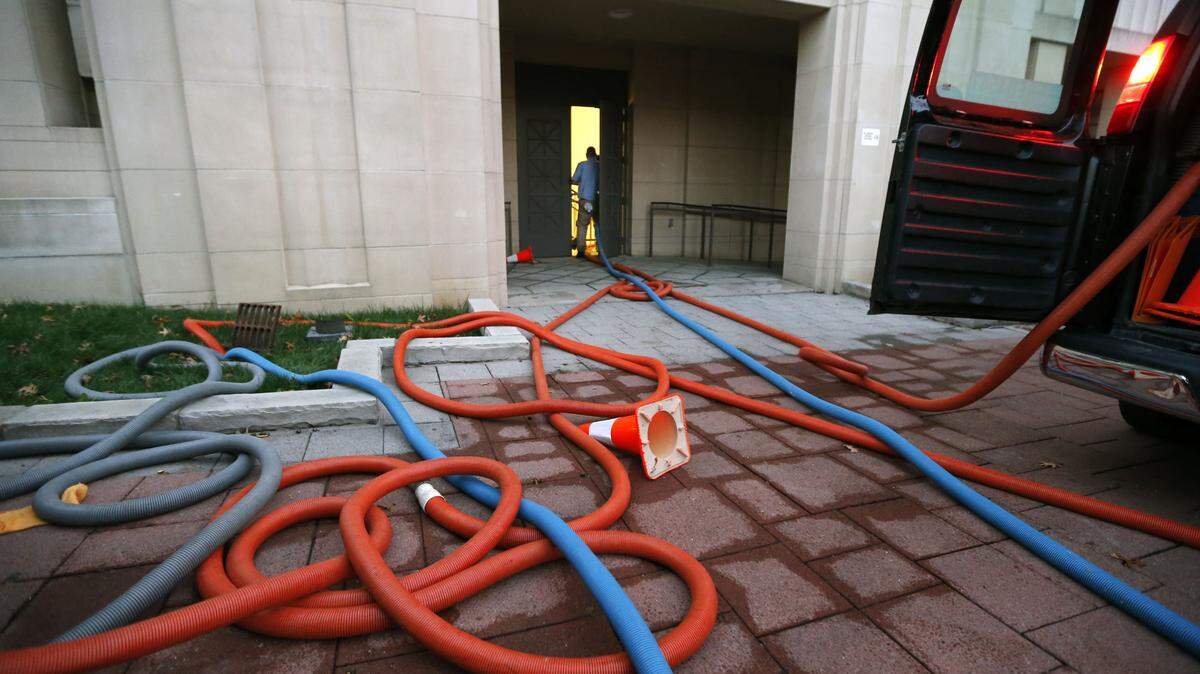 Cleanup crews were on the scene Monday after a leaky toilet flooded the Fayette Circuit Courthouse Sunday night.