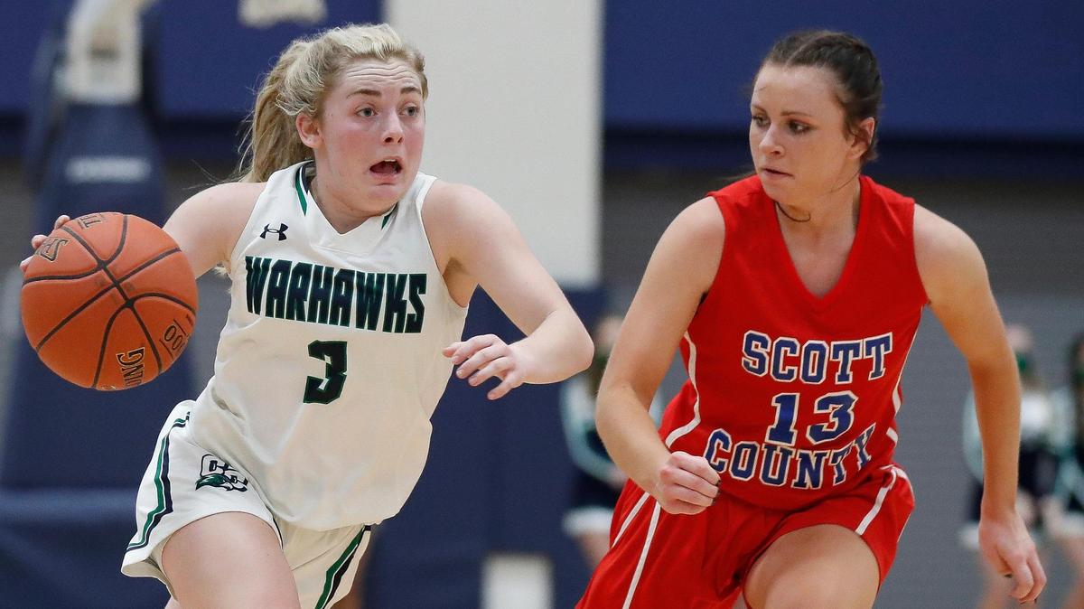 Great Crossing’s Braylee McMath (3) dribbled down court around Scott County’s Emma Price (13) during their game at Great Crossing High School in Georgetown Friday, Feb. 5, 2021. Great Crossing beat Scott County 61-51.
