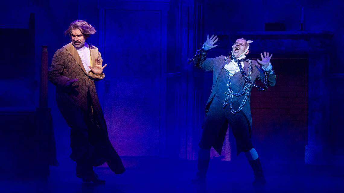 Ebenezer Scrooge, played by Denis Lambert, is freighted by Jacob Marley, played by Brance Cornelius. Cornelius, who has touring and regional stage credits, is a graduate of Lafayette High School and a Education Director for The Lex.