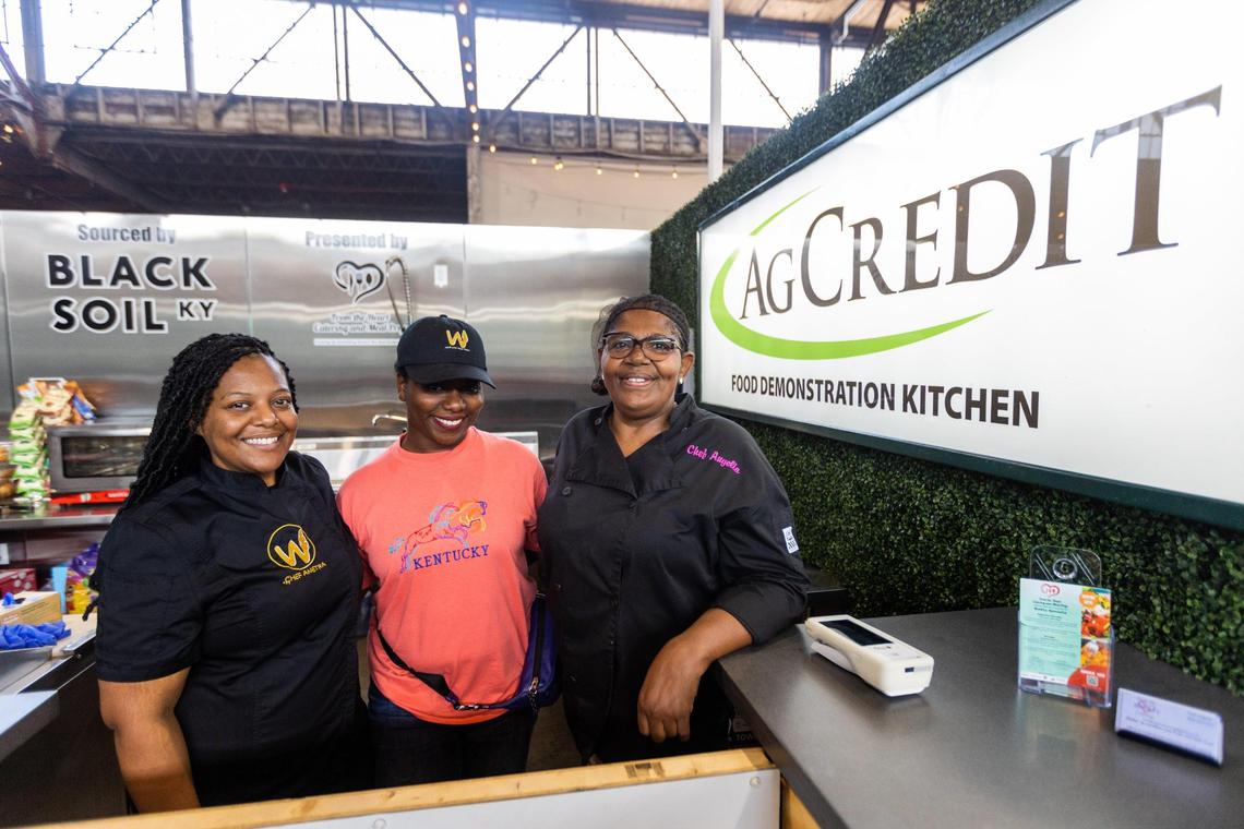 Woke Junk Food Vegan chef Anetra Polk, left, Black Soil KY Co-founder Ashley C. Smith, center, and From the Heart Catering chef Angelia Drake, right, at the Ag Credit demonstration kitchen at Julietta Market in Greyline Station. Chef Drake offers a varied menu daily, but had to stop serving salmon croquettes after the Lexington Fire Marshal ordered them to stop frying. Chef Polk has pop-ups on weekends featuring all-vegan menus.