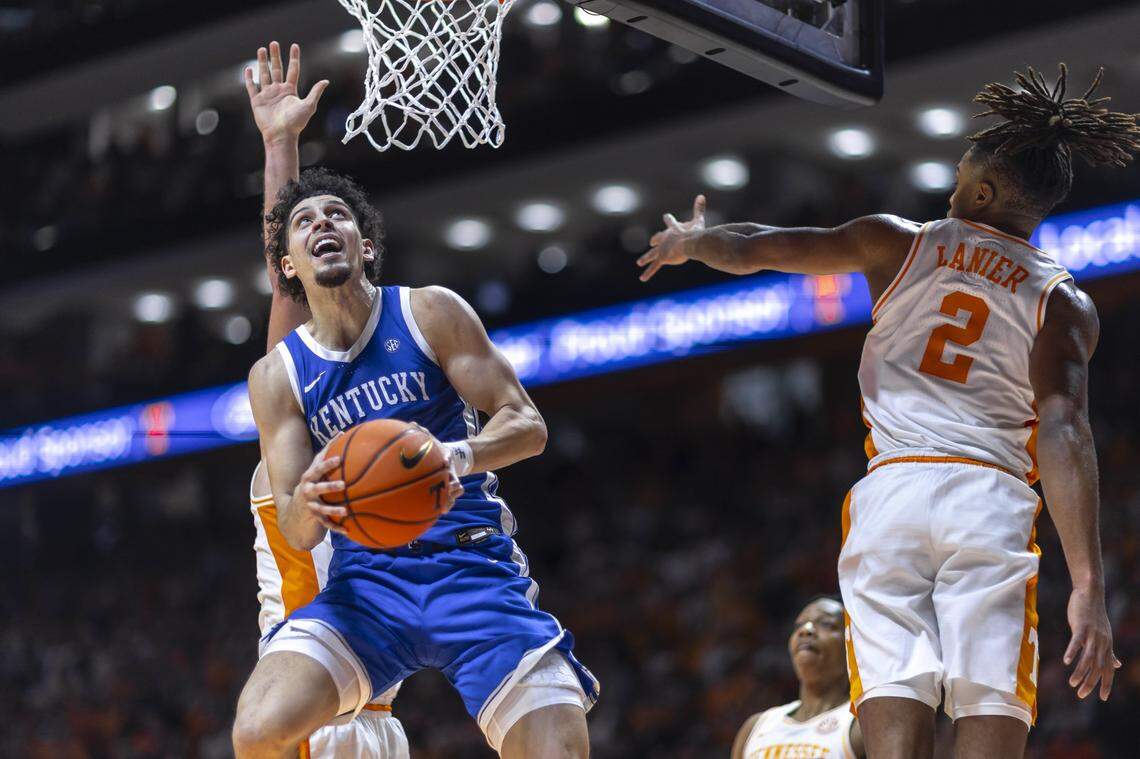 Kentucky guard Koby Brea (4) looks to shoot the ball as Tennessee guard Chaz Lanier (2) defends during Tuesday’s game at Thompson-Boling Arena in Knoxville, Tenn.