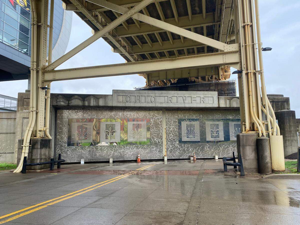 A flood wall under the 2nd Street bridge in downtown Louisville on Saturday. The Ohio River is expected to reach near-record levels by the end of the weekend.