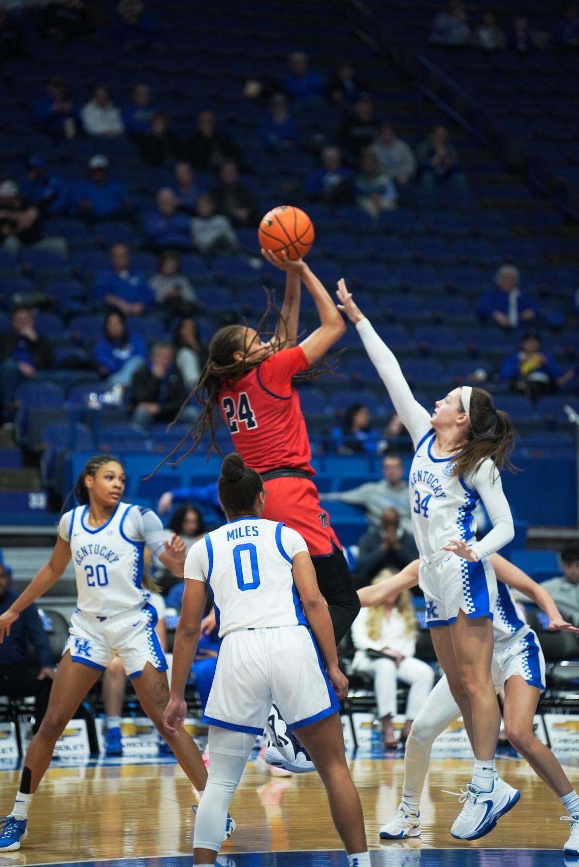Kentucky’s Emma King (34) challenges a shot by Mississippi’s Madison Scott (24) during Thursday night’s Ole Miss win in Rupp Arena.