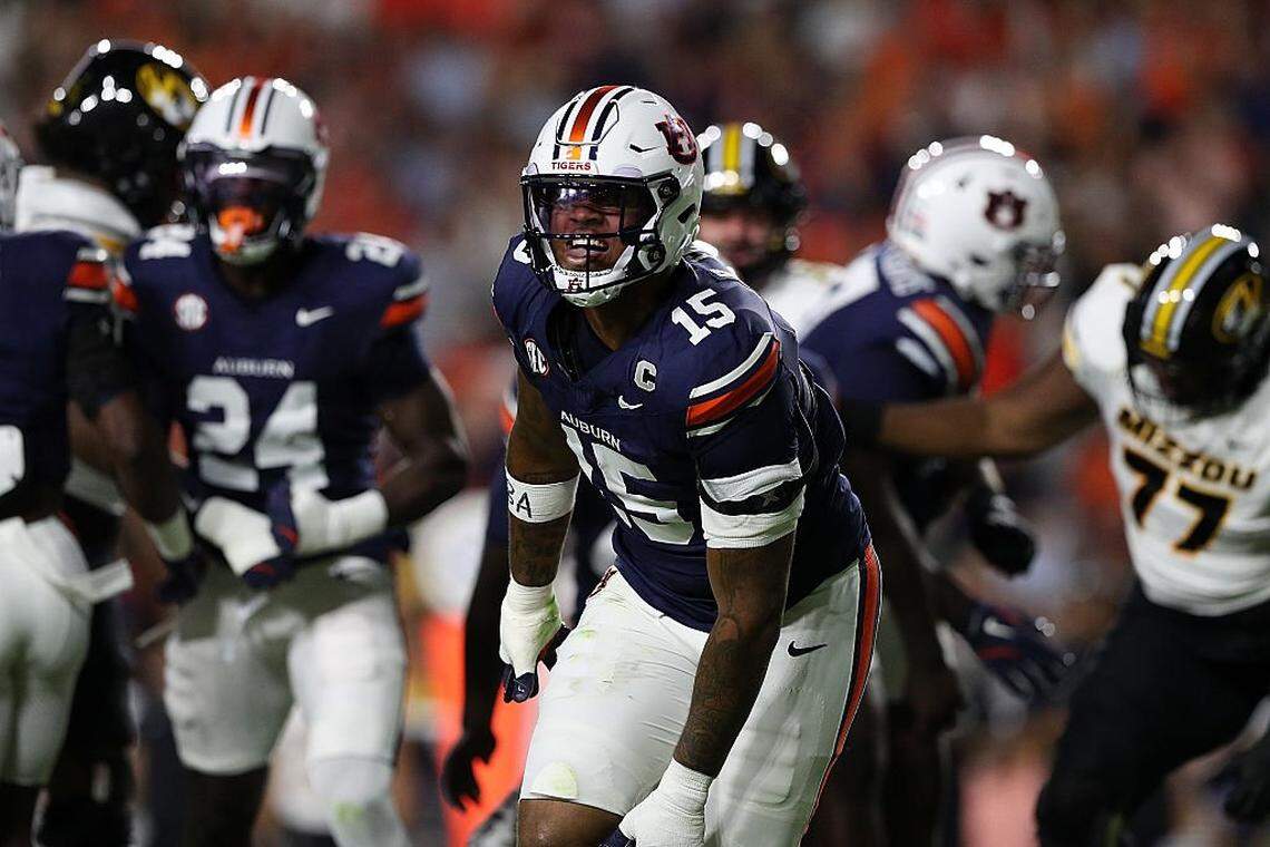 Auburn defensive end Keldric Faulk (15) has two quarterback sacks and five QB hurries so far in 2025.