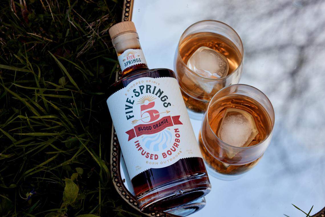 Five Springs Infused Bourbon, a new product that is in stores in Kentucky and in New Jersey, aims for the sweet spot between flavored bourbon and straight bourbon, for those new to whiskey. It is available in three flavors, Vanilla Maple, Honey Sage and Blood Orange.