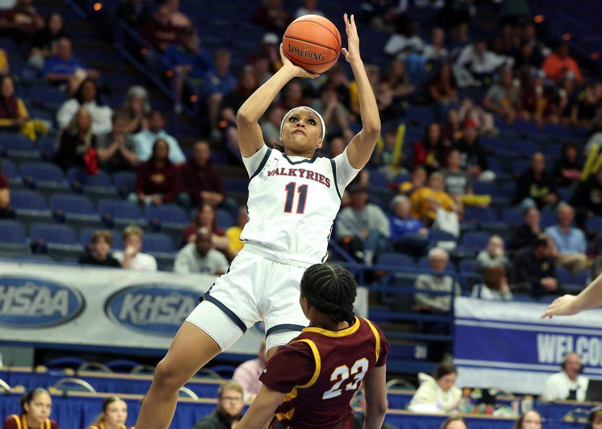 Sacred Heart’s ZaKiyah Johnson (11) finished Friday night’s win over Cooper with 20 points, 11 rebounds, six assists, three steals and two blocks.