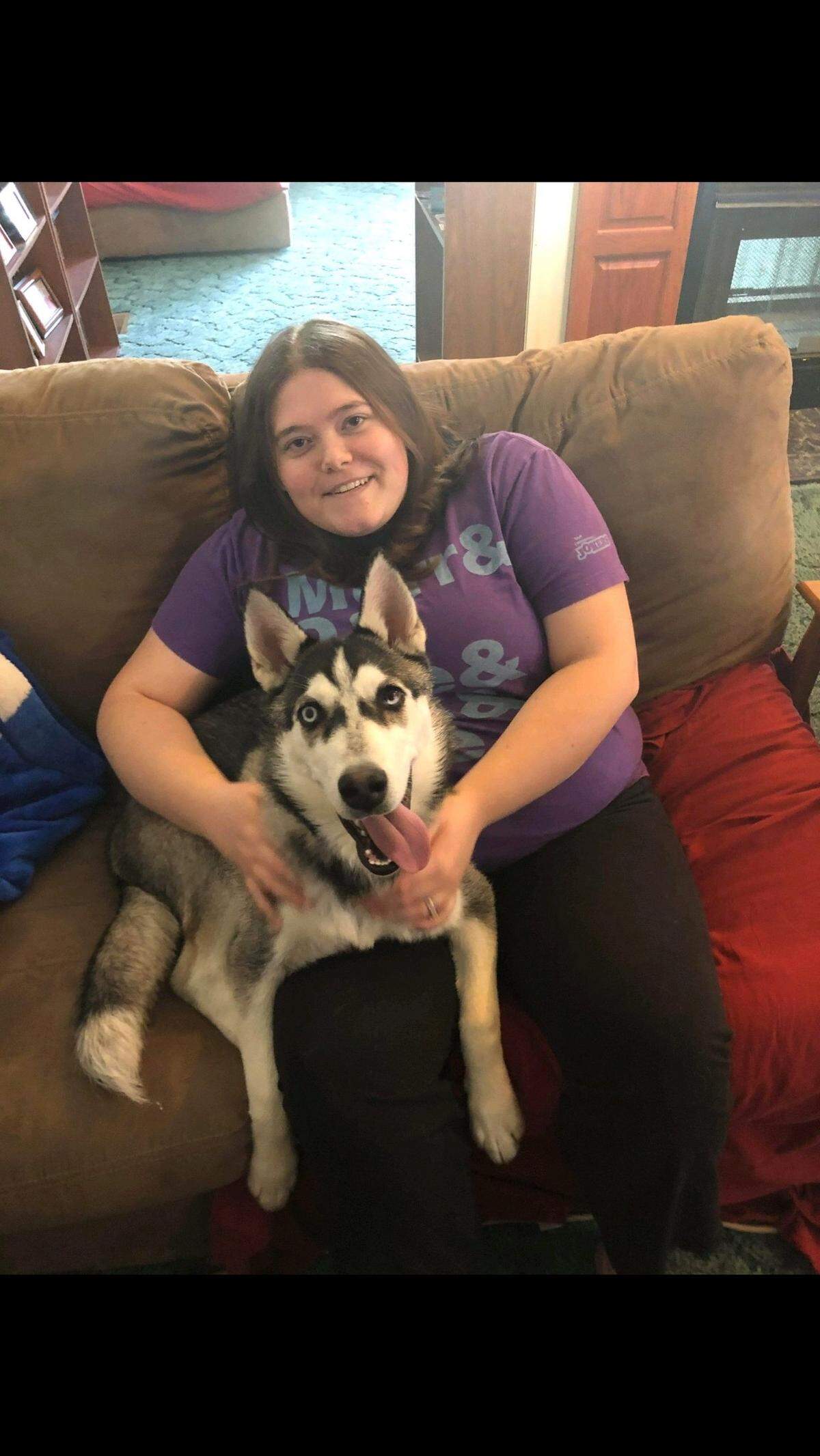 Julia Donohue at home with her puppy Kaiba