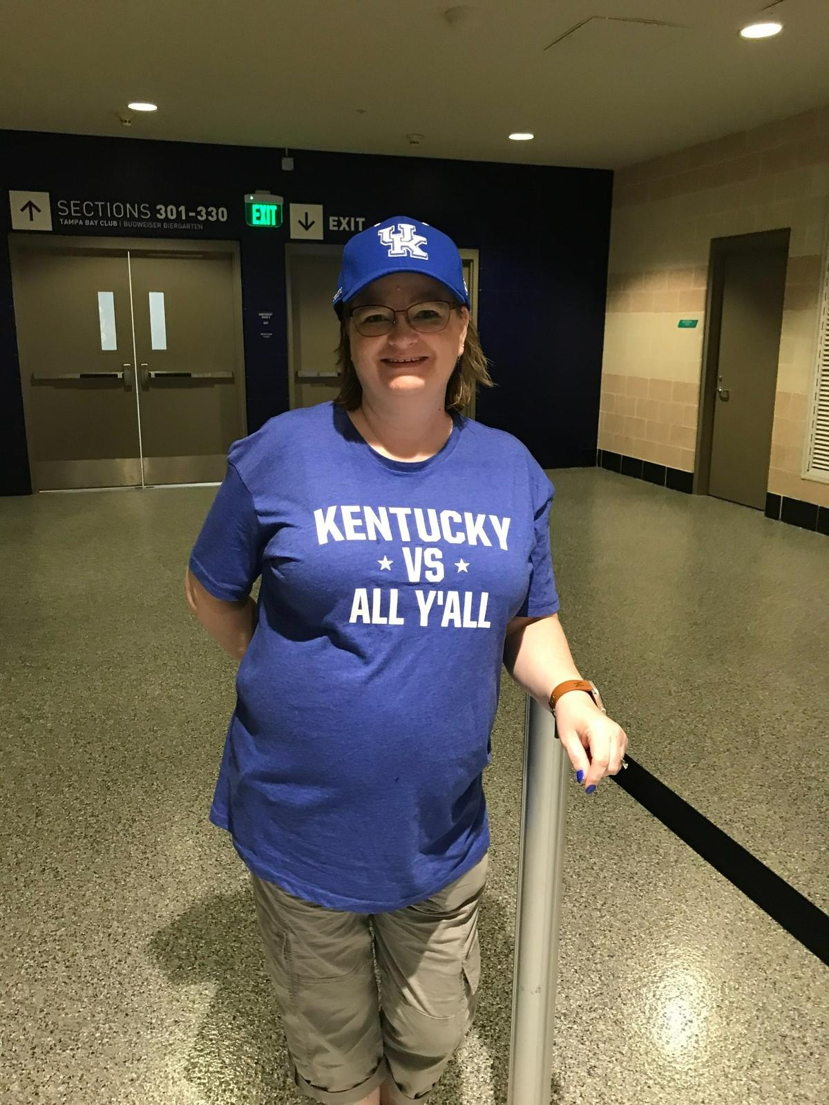 Kentucky fan Kim Silvey is in Tampa for the SEC Tournament this week. She said her T-shirt conveys “we’ll take on anybody at any time.”