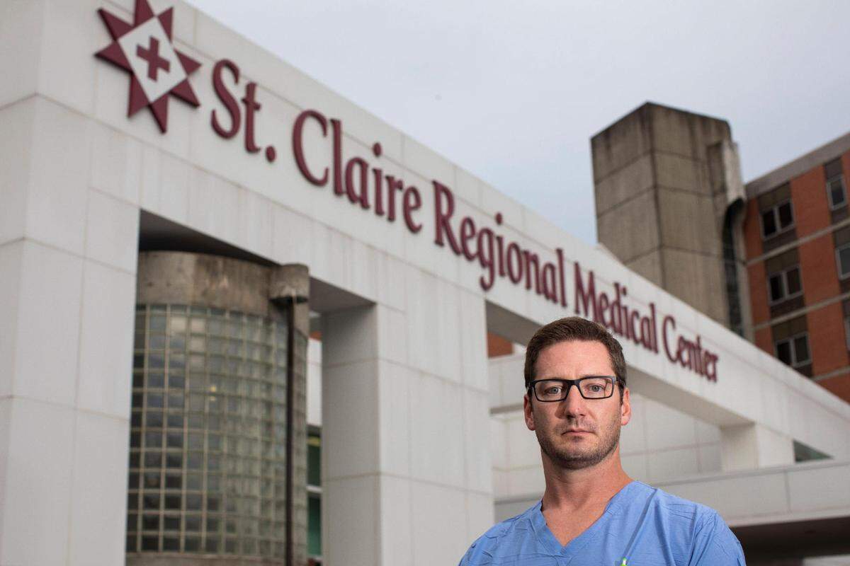 Dr. Philip Overall poses for a portrait outside the emergency room at St. Claire Regional Medical Center in Morehead, Ky., Wednesday, August 25, 2021.