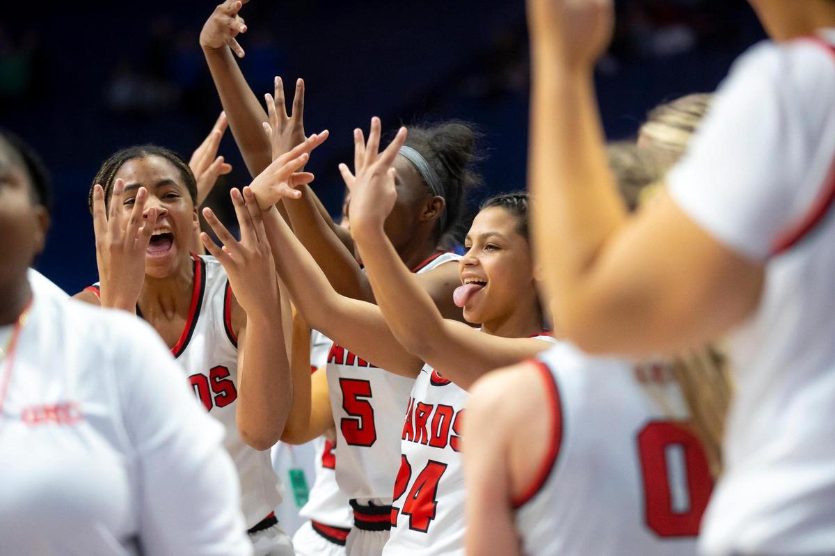 George Rogers Clark celebrates after defeating North Laurel to earn a matchup against two-time defending state champion Sacred Heart in Saturday’s semifinals.