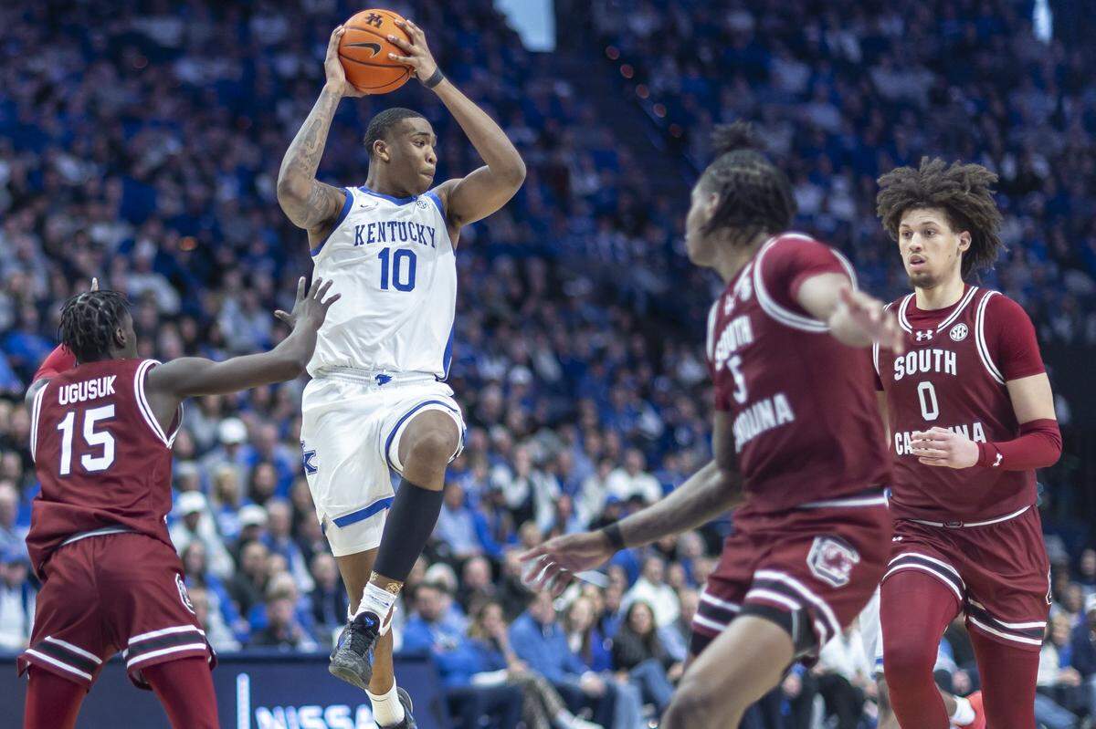 Kentucky forward Brandon Garrison (10) looks to move the ball as South Carolina guard Morris Ugusuk (15) defends during a game at Rupp Arena on Saturday. Garrison is averaging 6.0 points, 4.3 rebounds and 2.2 assists this season.