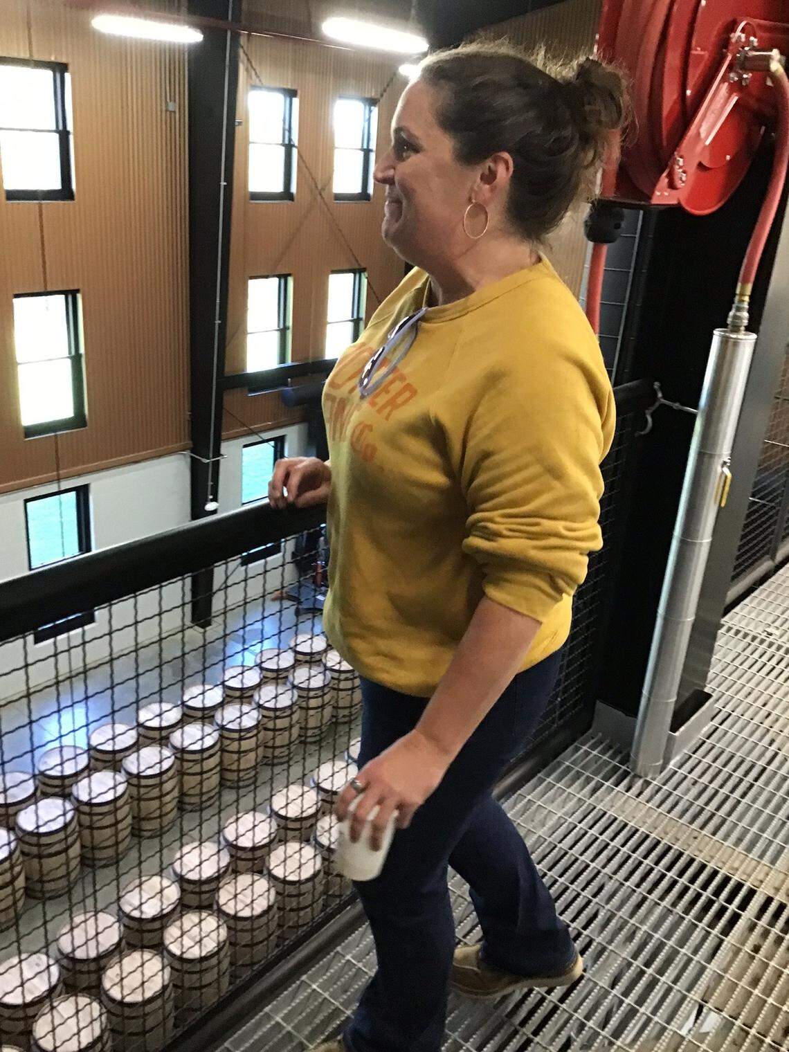 Jane Bowie, co-founder of Potter Jane Distillery in Springfield, Ky., overlooking the rows of newly filled barrels of bourbon waiting to be moved into rickhouses nearby. The distillery started production earlier this year and expects to release its first whiskeys in about seven years.