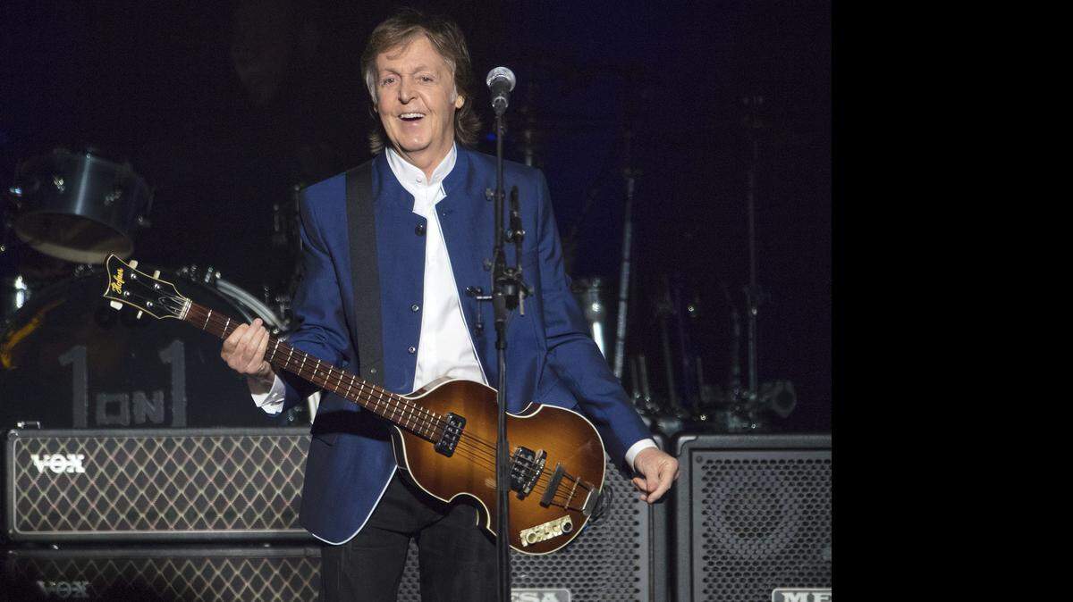 In this Monday, July 10, 2017 file photo, Sir Paul McCartney performs at Amalie Arena in Tampa, Fla.