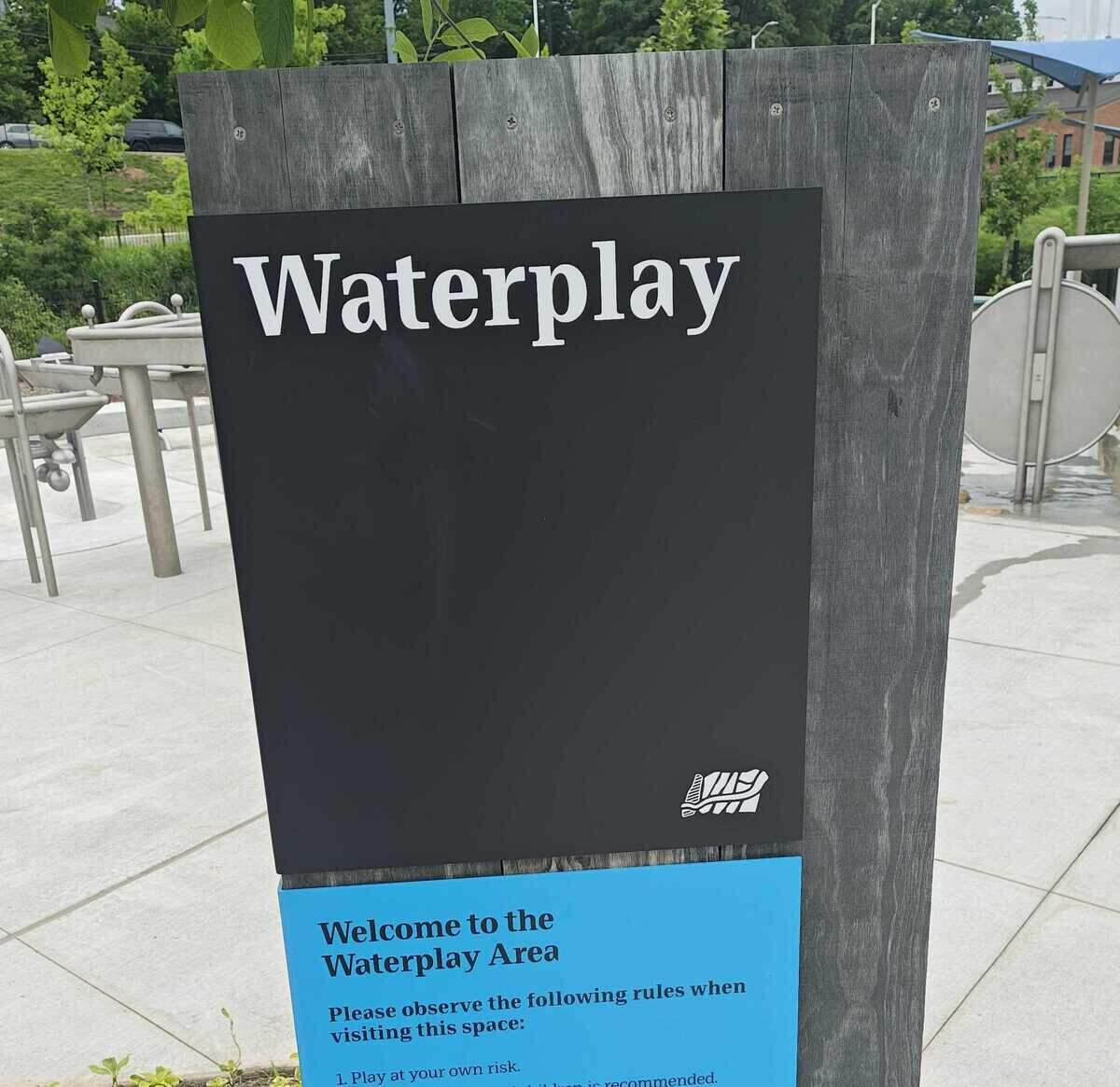 A sign at Gatton Park’s Waterplay feature does not mention Susan Naylor, who made a $2 million pledge to the park. Naylor is suing the park, alleging she was not allowed to name the area in according with her donation agreement with the park.