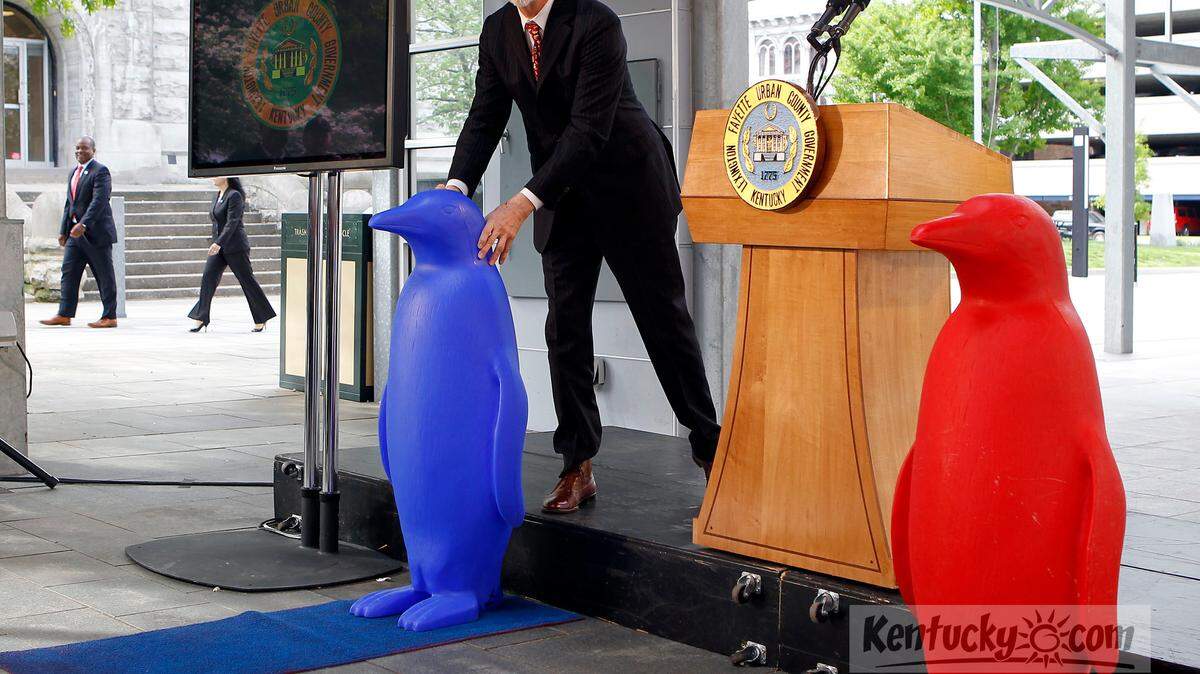 During a morning announcement, Louisville philanthropist Steve Wilson brought out a blue penguin that will be used in the Lexington 21c Hotel instead of their usual iconic red penguin. He has purchased the old First National Building and will convert in into the new hotel. Charles Bertram | Staff