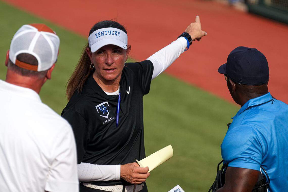 Kentucky head coach Rachel Lawson meets Texas Longhorns head coach Mike White ahead of the game at Red & Charline McCombs Field on Thursday, May 1, 2025 in Austin.