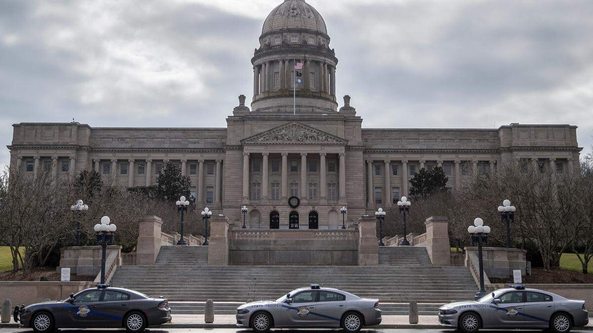 Kentucky State Police cars are parked outside the state Capitol in Frankfort, Ky., Thursday, Jan. 7, 2021, a day after Trump supporters rioted at the U.S. Capitol.