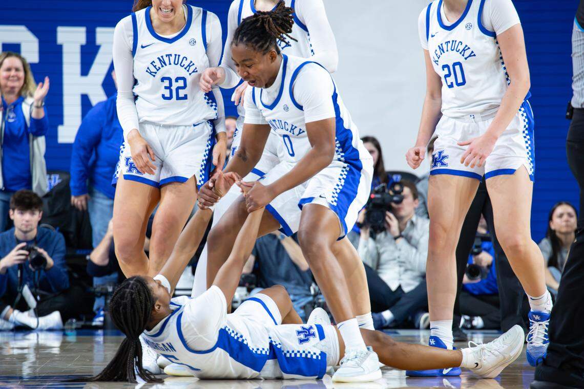 UK's Jordan Obi (0) helps up Tonie Morgan (5) after she shoots a three and gets fouled during the #6 University of Kentucky vs. the #5 Oklahoma Sooners game at Memorial Coliseum in Lexington, Ky, on Jan. 11, 2026.