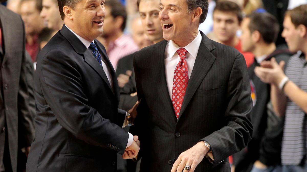 Kentucky Coach John Calipari, left, and Louisville Coach Rick Pitino shook hands before Kentucky defeated Louisville 69-62 on Dec. 31, 2011, in Rupp Arena. Calipari led Kentucky to the national title that season. Pitino would take his team to the title the next year.