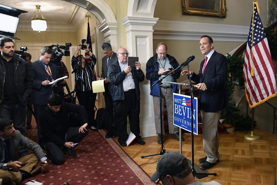Kentucky Governor Matt Bevin, right, announces his intent to call for a remcanvass of the voting results from Tuesday’s gubernatorial elections during a press conference at the Governor’s Mansion in Frankfort, Ky., Wednesday, Nov. 6, 2019. (AP Photo/Timothy D. Easley)