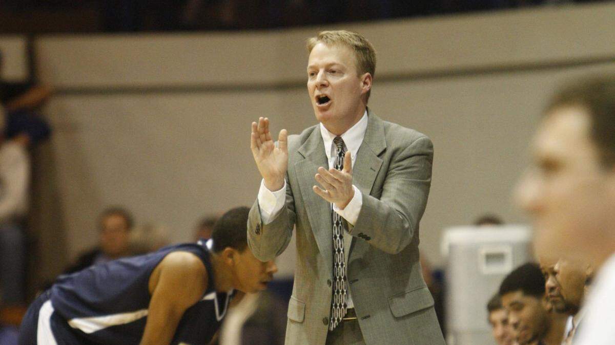Bryan Station head coach Champ Ligon shouted to his team during the fourth quarter of the Bryan Station at Mason County boys’ high school basketball game in Maysville,Ky on Friday,Feb. 22, 2008. Photo by Pablo Alcala | Staff 5151..SECOND HALF.
