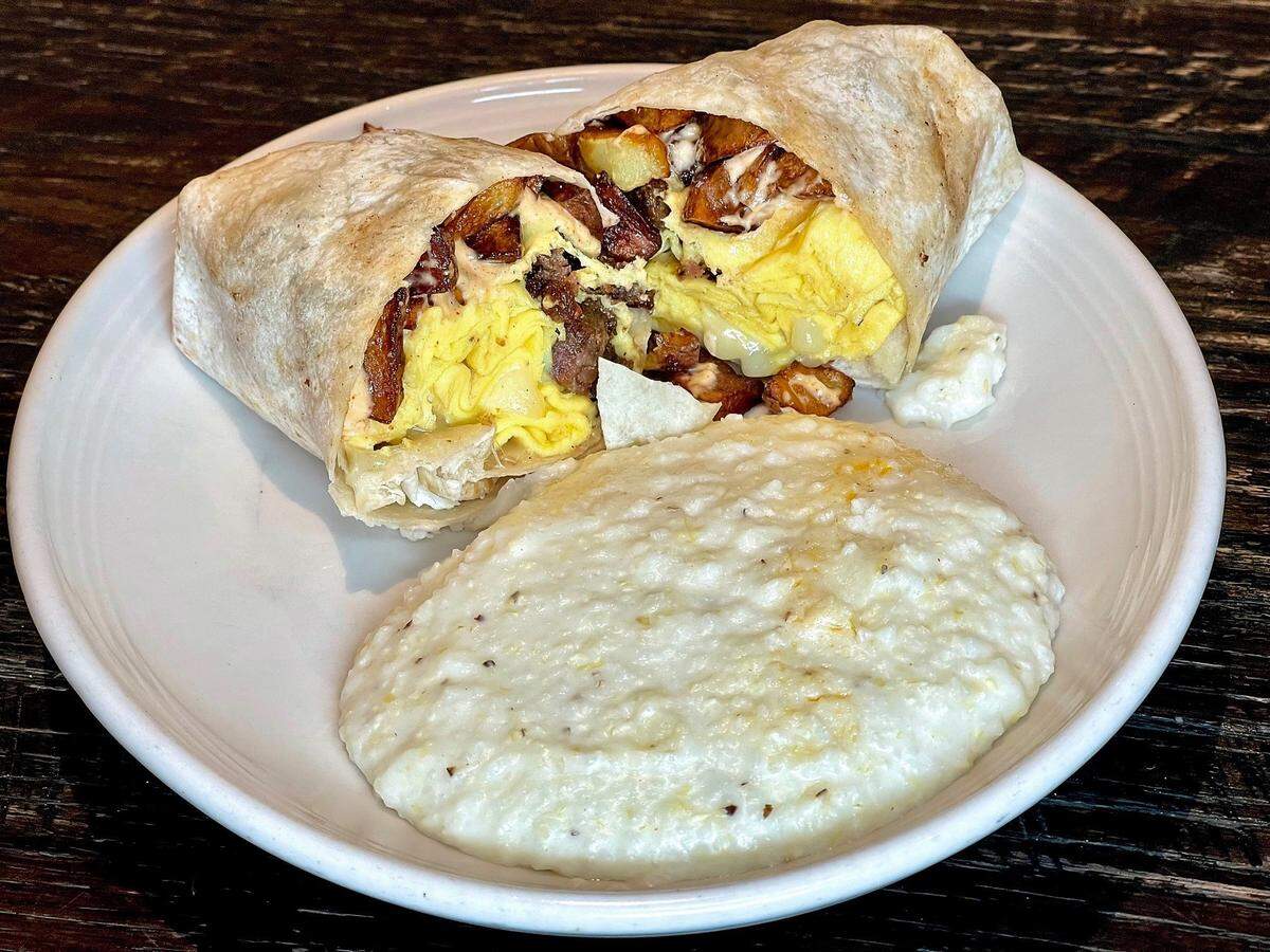 The Sausage Breakfast Burrito from Zim’s Café in downtown Lexington comes with Weisenberger Mill cheese grits.