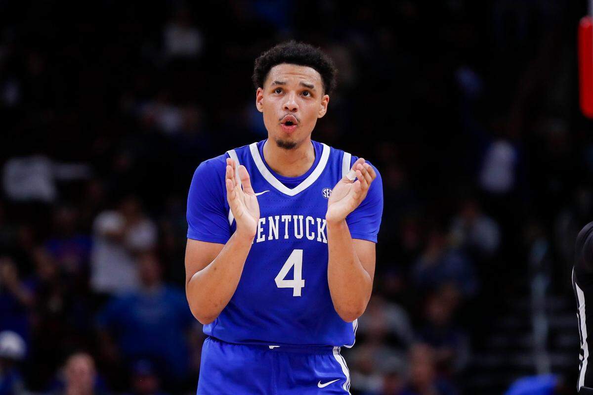 Kentucky super-senior Tre Mitchell (4) is providing a front-court presence and some experience to a backcourt-oriented and youthful UK roster.