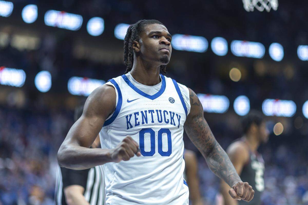 Kentucky guard Otega Oweh (00) reacts after scoring a basket during an SEC Tournament game against Oklahoma at Bridgestone Arena in Nashville, Tennessee.
