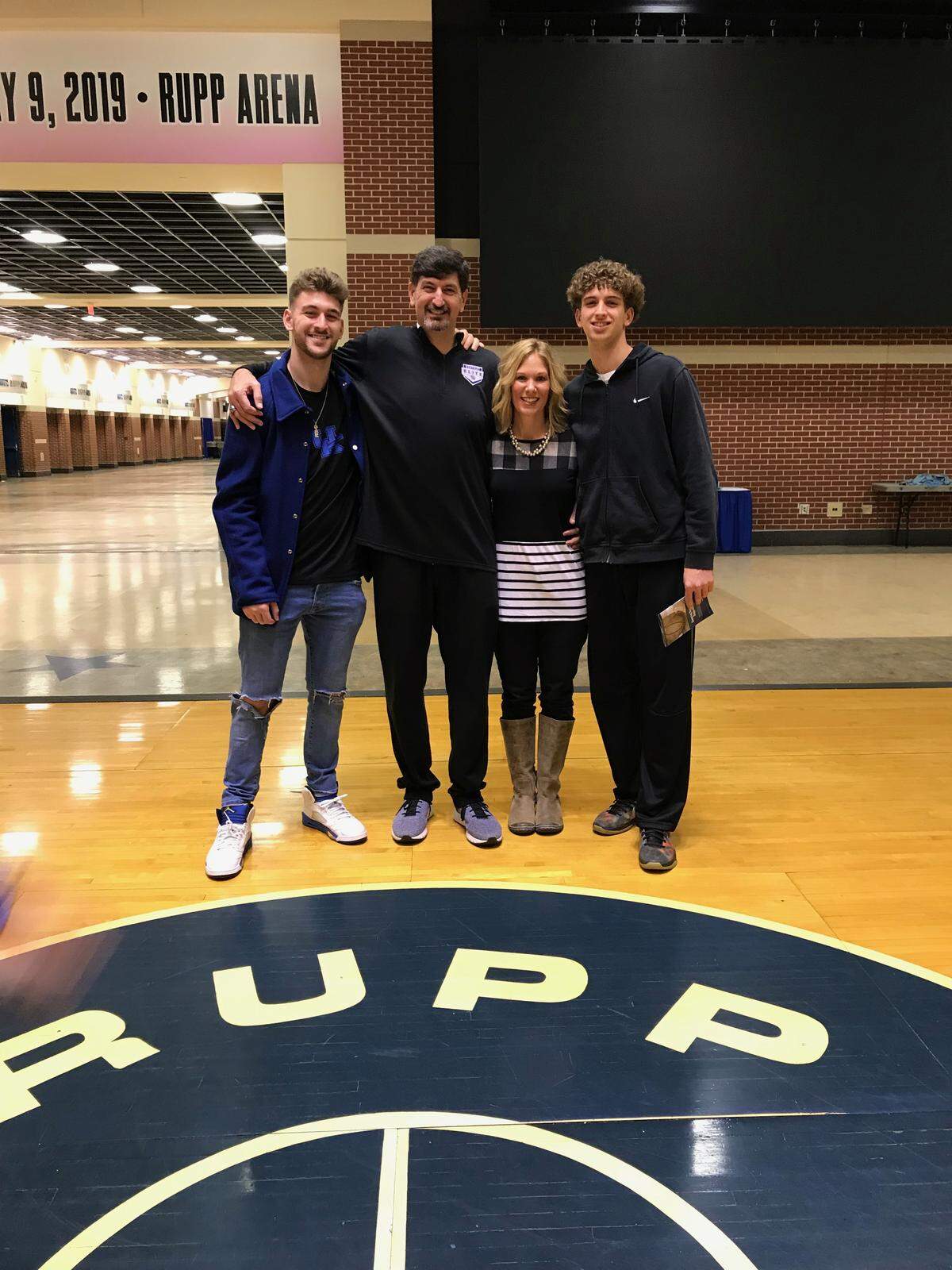 Former Kentucky basketball player Gimel Martinez, second from left, with his family: son Gimel Jr., left, wife Missy and son Myles.