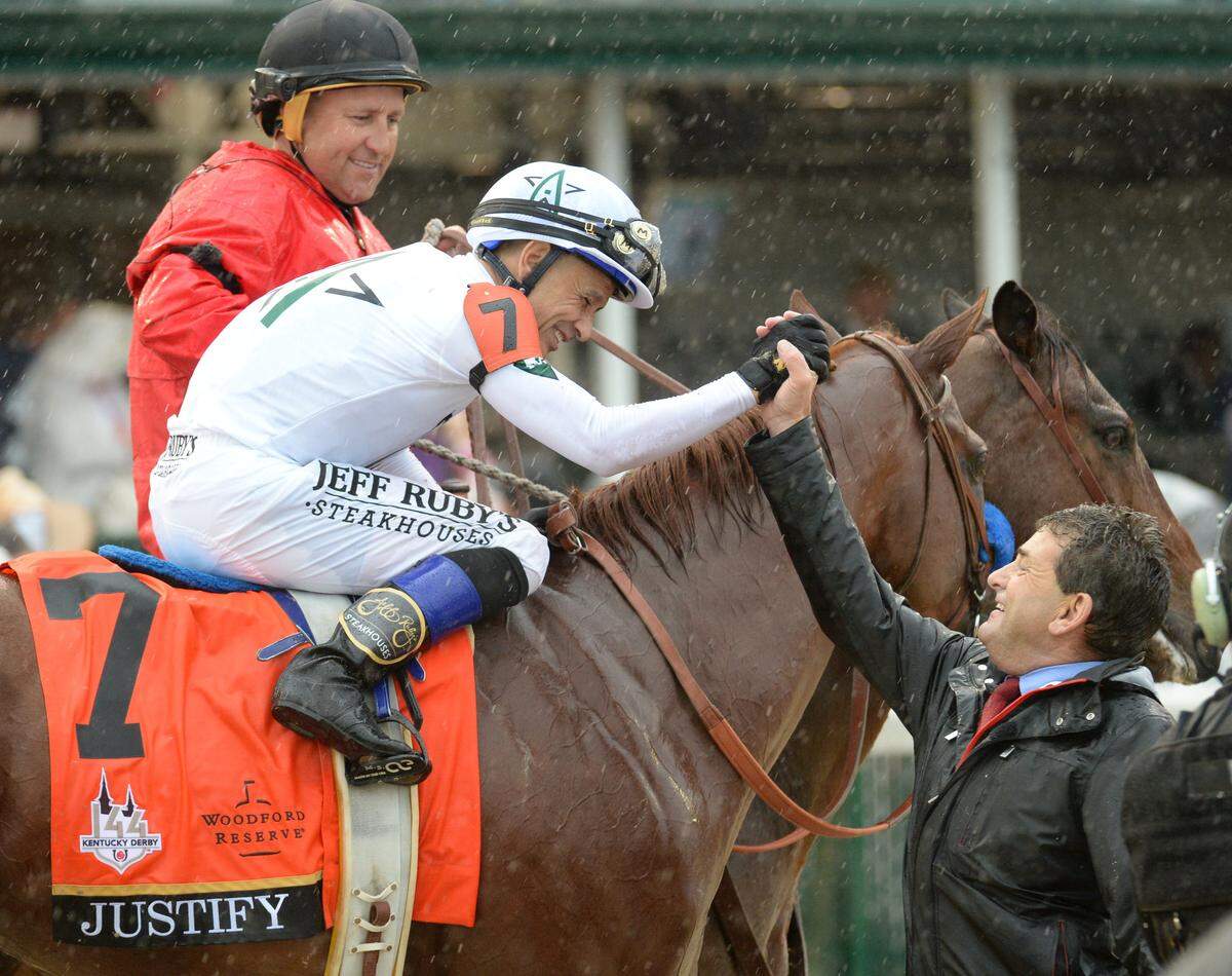 Jockey Mike Smith celebrated with Justify after their win in the 144th running of the Kentucky Derby.