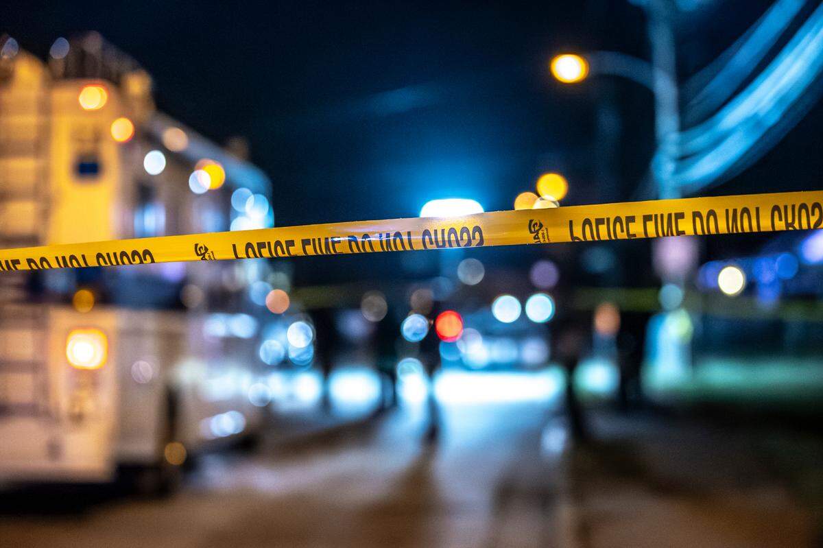 Members of the Lexington Police Department work the scene where a detective was shot overnight near Royal Avenue in Lexington, Ky., on Thursday, Feb. 29, 2024.